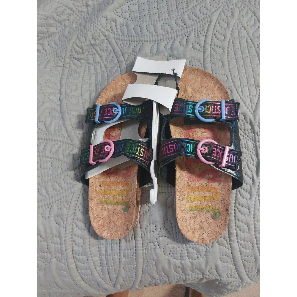 Justice Sandals Mis-sized says Sz 5 but are sz around sz 8 runs large